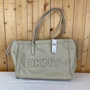 DKNY Essie Drawstring Tote NWT - Beige, about 15x12x5 inches